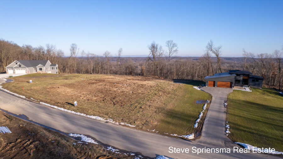 drone shots of a lot listed lot in Lowel, Michigan